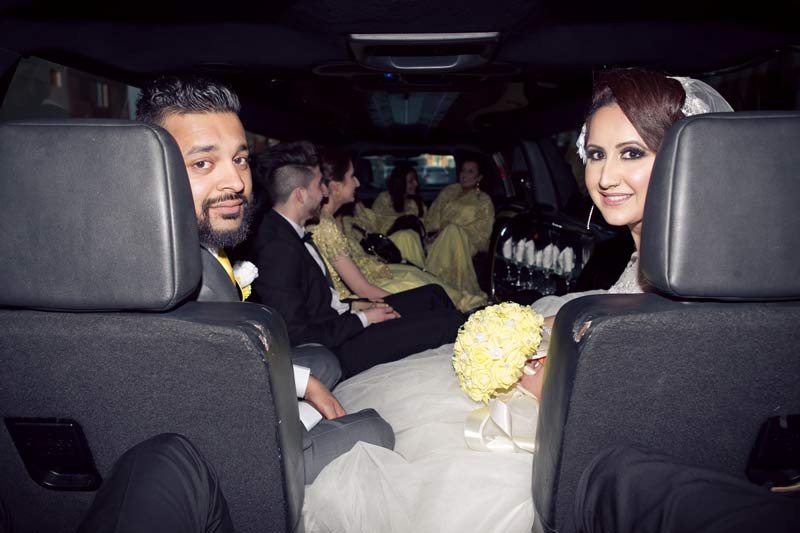 Bride & Groom in the Limo